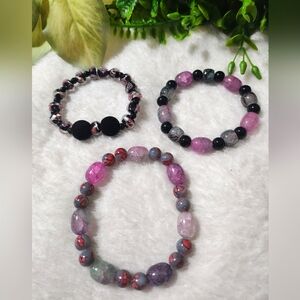 Handmade black, grey, and pink beaded bracelets